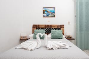 Letto o letti in una camera di Pension Stella