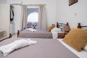 Letto o letti in una camera di Pension Stella