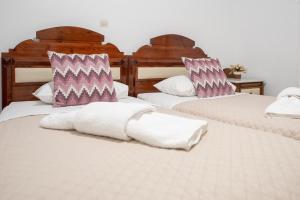 Letto o letti in una camera di Pension Stella