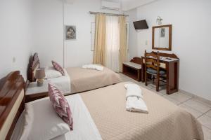 Letto o letti in una camera di Pension Stella