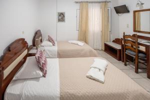 Letto o letti in una camera di Pension Stella