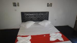 Postel nebo postele na pokoji v ubytování The Kingston Hotel