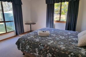 Postel nebo postele na pokoji v ubytování Burramere Homestead + 18 fotografií