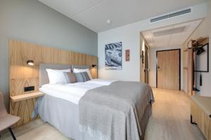 Postel nebo postele na pokoji v ubytování Quality Hotel Harstad