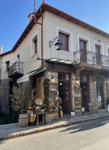 a store on the side of a building at Agora Mansion in Arachova