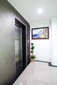 TV a/nebo společenská místnost v ubytování Tone Condorent Hotel