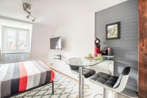 Postel nebo postele na pokoji v ubytování StuDio 11 - Centre-ville - Cozy