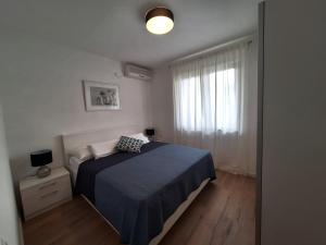 Postel nebo postele na pokoji v ubytování Villa Sirius