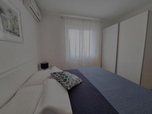 Postel nebo postele na pokoji v ubytování Villa Sirius