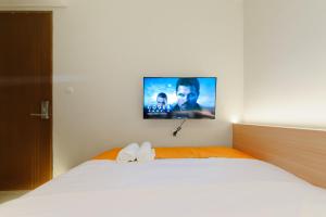 Μια τηλεόραση ή/και κέντρο ψυχαγωγίας στο Sans Hotel Pesona Bekasi