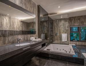 Koupelna v ubytování All-Ur Boutique Motel - Xinzhuang Branch + 37 fotografií