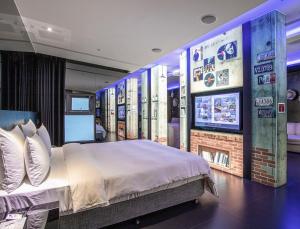 Postel nebo postele na pokoji v ubytování All-Ur Boutique Motel - Xinzhuang Branch