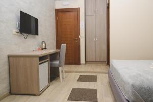 TV a/nebo společenská místnost v ubytování IPN ROOMs