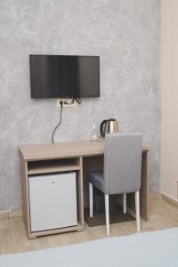 TV a/nebo společenská místnost v ubytování IPN ROOMs