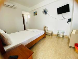 TV a/nebo společenská místnost v ubytování Nhat Hoang Hotel