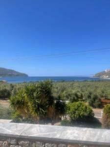 a view of the ocean from the balcony at LITHOS by the sea in Neo Itilo