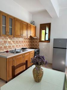 A kitchen or kitchenette at Private Cozy Home Vlore