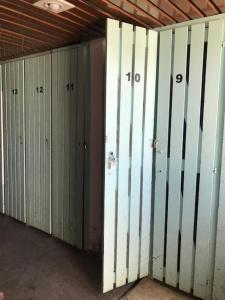 a row of metal lockers in a room at Découverte de la vallée d'Eyne et des bains de Llo in Eyne