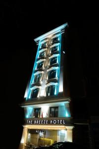 a hotel building with blue lights on it at The Breeze Hotel in Eskisehir