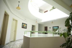 TV in/ali zabaviščno središče v nastanitvi SIRENA HOTEL