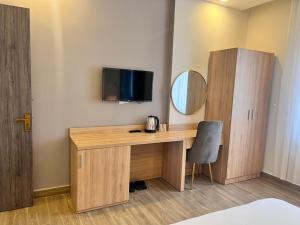 TV a/nebo společenská místnost v ubytování Q's House Dalat