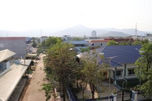an aerial view of a city with houses at AHHA Boutique Kampot in Kampot