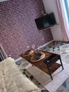 TV a/nebo společenská místnost v ubytování Studio maillane