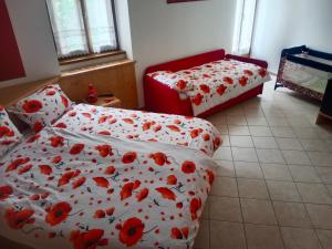 Postel nebo postele na pokoji v ubytování Bed and Breakfast Galet