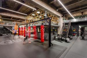 a group of red fire hydrants in a building at Postillion Hotel WTC Rotterdam in Rotterdam