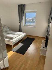 Postel nebo postele na pokoji v ubytování Appartement Telfs