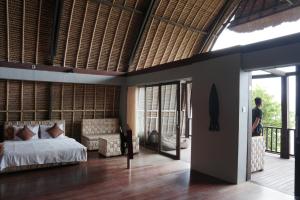 Postel nebo postele na pokoji v ubytování Agung View Villa, Nusa Penida