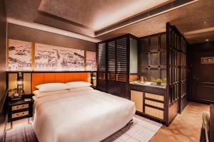 Voodi või voodid majutusasutuse Hotel Central 新中央酒店 toas