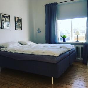 Letto o letti in una camera di Vadstena Vandrarhem-Hostel