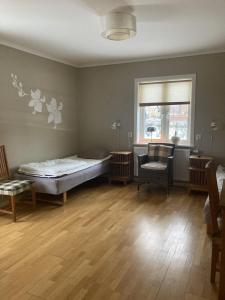Letto o letti in una camera di Vadstena Vandrarhem-Hostel