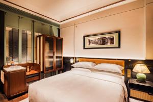 Voodi või voodid majutusasutuse Hotel Central 新中央酒店 toas