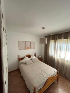 Ένα ή περισσότερα κρεβάτια σε δωμάτιο στο CASA ZOE