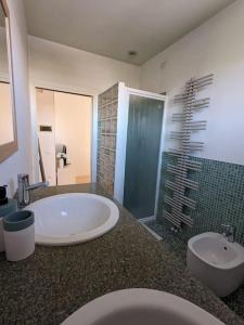 Et badeværelse på Appartamento Ilaria