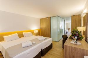 Letto o letti in una camera di Calypso Palace