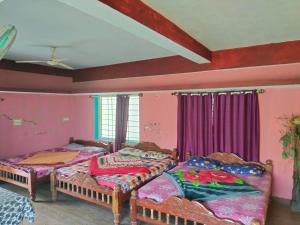 Postel nebo postele na pokoji v ubytování Coorg Kusumas homestay