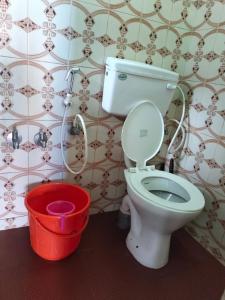 Koupelna v ubytování Coorg Kusumas homestay + 28 fotografií