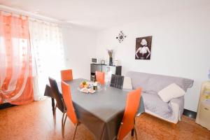 a dining room with a table and a couch at Ferienwohnung für 6 Personen ca 90 m in Novigrad, Adriaküste Kroatien Westküste von Istrien in Karpinjan +10 photos