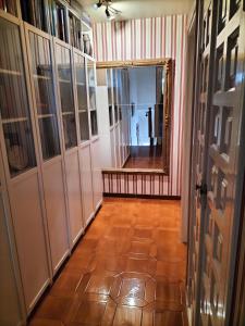 a hallway with an open door and a mirror at CASA MARINERA ALCOSSEBRE in Alcossebre +32 photos