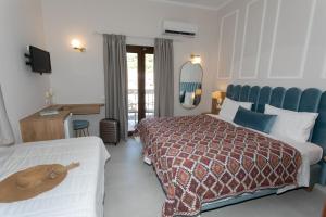 Posteľ alebo postele v izbe v ubytovaní Paradise Hotel