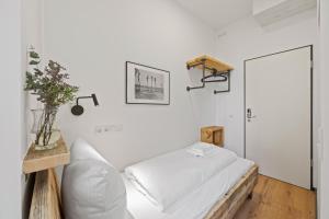 Postel nebo postele na pokoji v ubytování Hotel Comenius