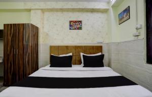 Voodi või voodid majutusasutuse HOTEL VISTA 18 INN toas