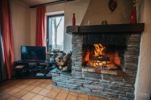 Μια τηλεόραση ή/και κέντρο ψυχαγωγίας στο La Chaume du Faing - 8 pers. - Malmedy