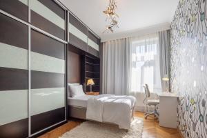 Postel nebo postele na pokoji v ubytování Pytloun Villa Liberec