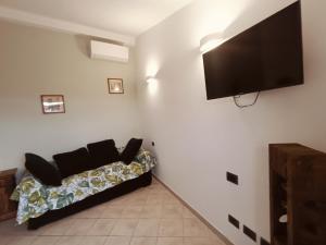TV a/nebo společenská místnost v ubytování CASA ORNETO