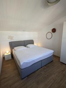 Postel nebo postele na pokoji v ubytování Kiek ut