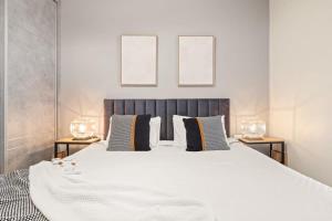 Ένα ή περισσότερα κρεβάτια σε δωμάτιο στο Modern & Comfortable 1-Bedroom Oasis with Luxury Amenities +30 φωτογραφίες